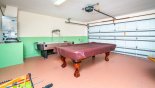 Games room with pool table, air hockey, table foosball and darts from Highlands Reserve rental Villa direct from owner