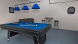 Games room with pool table, air hockey, table foosball & darts with this Orlando Villa for rent direct from owner