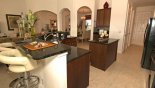 Kitchen breakfast bar with 2 bar stools - www.iwantavilla.com is the best in Orlando vacation Villa rentals