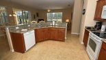 Fully fitted kitchen with granite counter tops & quality appliances - www.iwantavilla.com is the best in Orlando vacation Villa rentals