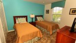 Bedroom 2 with twin sized beds & flat screen TV from Eagle Bay 1 Villa for rent in Orlando