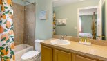 Master #2 ensuite bathroom with bath & shower over, single sink & WC - www.iwantavilla.com is the best in Orlando vacation Villa rentals