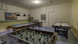 Games room with pool table, air hockey & table foosball from Tahiti 1 Villa for rent in Orlando