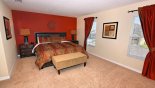 Master bedroom 2 with king size bed and views to front aspect with this Orlando Villa for rent direct from owner