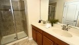 Master 1 ensuite bathroom with double walk-in shower - www.iwantavilla.com is the best in Orlando vacation Villa rentals