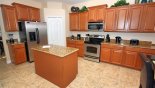 Spacious rental The Shire at West Haven Villa in Orlando complete with stunning fully fitted kitchen with granite countertops & quality appliances