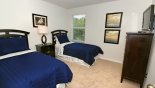 Bedroom 3 with twin sized beds & flat screen TV from Ocean Palm 1 Villa for rent in Orlando
