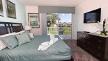 Orlando Townhouse for rent direct from owner, check out the Master bedroom with flat screen TV and access to private balcony