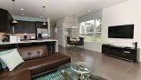 Living room with large flat screen TV from Eliora 4 Townhouse for rent in Orlando