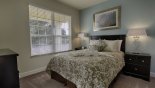 Downstairs queen bedroom with this Orlando Townhouse for rent direct from owner