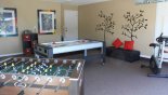 Games room with table foosball, air hockey and exercise bike from Veranda Palms rental Villa direct from owner