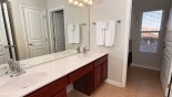 Family bathroom #4 with seperate shower/tub and toilet area. with this Orlando Villa for rent direct from owner
