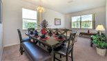 Spacious rental Highlands Reserve Villa in Orlando complete with stunning View of dining area & living room from entrance hallway