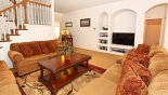 Family room with large LCD TV & DVD player - www.iwantavilla.com is the best in Orlando vacation Villa rentals