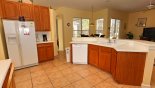 Spacious rental Highlands Reserve Villa in Orlando complete with stunning Fully fitted kitchen with Corian countertops