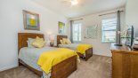 Ground floor bedroom 5 with twin beds & LCD TV - www.iwantavilla.com is the best in Orlando vacation Villa rentals