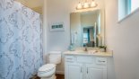 Ensuite bathroom 3 with bath & shower over from Coconut Palm 4 Villa for rent in Orlando