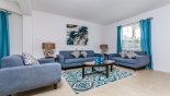 Villa rentals near Disney direct with owner, check out the Living room with 2 comfortable sofas & an arm chair