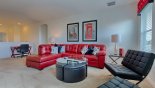 Spacious rental Providence Villa in Orlando complete with stunning London theme with sumptuous leather sectional suite