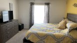 Villa rentals near Disney direct with owner, check out the Master bedroom with smart tv.