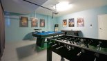 Games room with pool table, air hockey & table foosball - www.iwantavilla.com is your first choice of Villa rentals in Orlando direct with owner