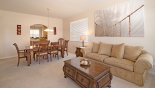 Villa rentals near Disney direct with owner, check out the Living room with adjacent dining area
