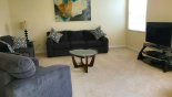 Villa rentals in Orlando, check out the Family room with large LED TV & DVD player