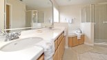 Master #1 ensuite bathroom with Roman bath, walk-in shower, dual vanities & separate WC from Canterbury 8 Villa for rent in Orlando