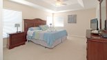Master bedroom #1 with LCD cable TV with this Orlando Villa for rent direct from owner