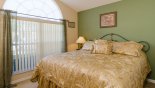 Spacious rental Orange Tree Villa in Orlando complete with stunning Bedroom 3 with queen bed & views onto front gardens