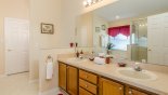 Master 1 ensuite bathroom with his 'n' her sinks, bath & walk-in shower from Magnolia Tree 1 Villa for rent in Orlando