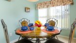 Villa rentals in Orlando, check out the Breakfast nook with seating for 4 next to kitchen
