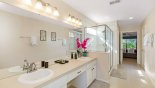 Villa rentals in Orlando, check out the Second Floor Master ensuite bathroom with bath, large walk-in shower, dual sinks & separate WC