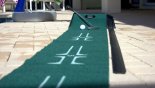 Practice your putting skills on the pool deck from Brentwood 1 Villa for rent in Orlando