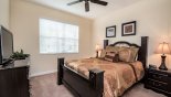 Ground floor bedroom 6 with king sized bed from Majesty Palm 2 Villa for rent in Orlando