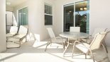 Villa rentals in Orlando, check out the Covered lanai with patio table & 4 chairs