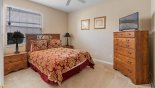 Ground floor bedroom #5 with queen sized bed & LCD cable TV from Canterbury 2 Villa for rent in Orlando