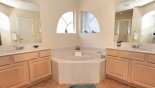 Master ensuite bathroom with bath, large walk-in shower, dual sinks & separate WC from Birchwood 5 Villa for rent in Orlando