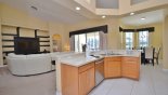Fully fitted kitchen with view of dining nook with this Orlando Villa for rent direct from owner