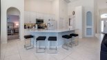 Kitchen breakfast bar with 5 bar stools with this Orlando Villa for rent direct from owner