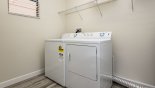 Laundry room with washer & dryer with this Orlando Villa for rent direct from owner
