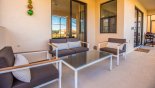 Covered lanai with comfortable seating from Solterra Resort rental Villa direct from owner
