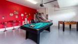 Games room with pool table, table tennis, table foosball, basketball game & popcorn machine from Champions Gate rental Villa direct from owner