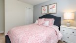 Bedroom #5 with queen sized bed & pink flamingo theming from Champions Gate rental Villa direct from owner