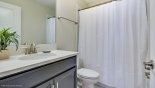 Family bathroom #4 with bath & shower over from Champions Gate rental Villa direct from owner