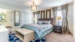Spacious rental Champions Gate Townhouse in Orlando complete with stunning Master bedroom viewed towards ensuite bathroom