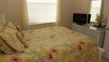 Master bedroom #2 with LCD cable TV & views onto pool deck from Emerald + 6 Villa for rent in Orlando