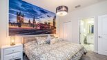 Master #2 bedroom with London skyline feature wall from Champions Gate rental Villa direct from owner