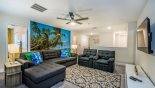 Entertainment loft area with sectional sofa & 2 arm chairs from Maui 7 Villa for rent in Orlando