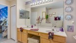 Villa rentals in Orlando, check out the Master ensuite bathroom with bath, walk-in shower & his 'n' hers sinks